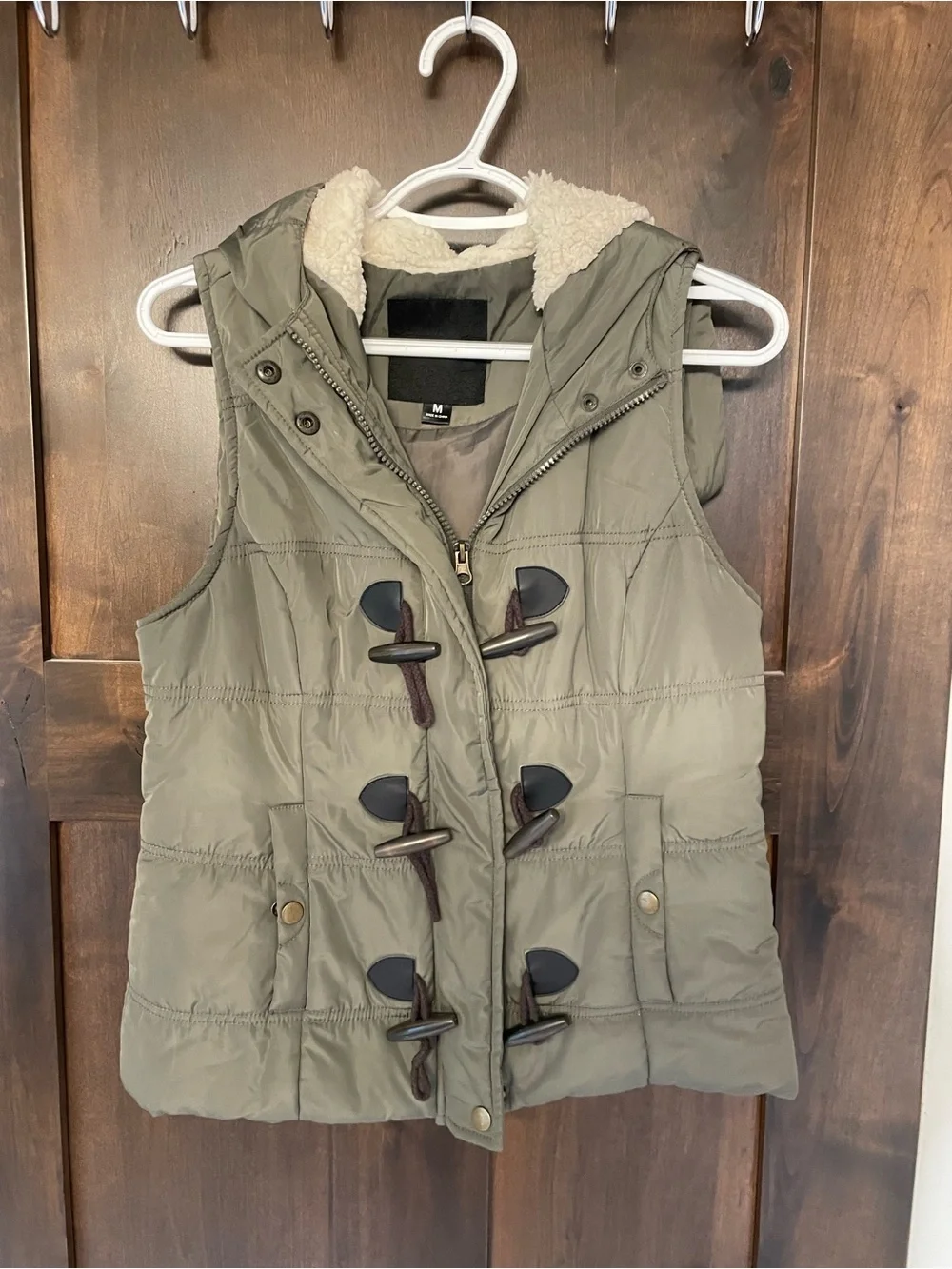 Women’s Olive Hooded Puffer Vest with Toggle Closure